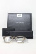 A pair of as new Tom Davies glasses frames.