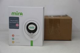 A boxed as new Mira Fertility Plus starter Kit EVA3000 (includes 1 digital analyser and ten test