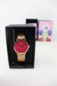 A women's as new Coluri Kahlo watch in scarlet (RRP £139).