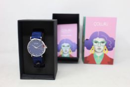 A women's as new Coluri Kahlo watch in navy (RRP £139).
