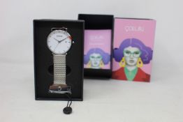 A women's as new Coluri Kahlo watch in snow (RRP £139).