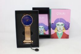A women's as new Coluri Kahlo watch in navy (RRP £139).