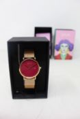 A women's as new Coluri Kahlo watch in scarlet (RRP £139).