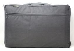 An as new Brass Bags Quad musical instrument case.