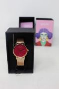 A women's as new Coluri Pankhurst watch in scarlet (RRP £139).