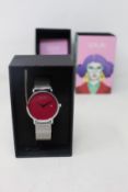 A women's as new Coluri Kahlo watch in scarlet (RRP £139).