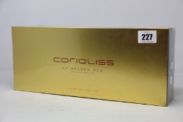 A boxed as new Corioliss C3 Golden Red hair straightener.
