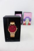A women's as new Coluri Kahlo watch in scarlet (RRP £139).