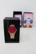 A women's as new Coluri Pankhurst watch in scarlet (RRP £139).