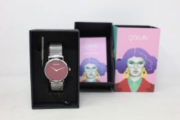 A women's as new Coluri Kahlo watch in scarlet (RRP £139).