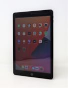 A pre-owned Apple iPad 9.7