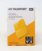 A boxed as new WD My Passport 2TB in Yellow (Box sealed).