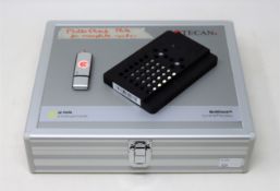 A pre-owned Tecan Multicheck Plus II QC Plate for Tecan Infinite Microplate Readers (USB stick