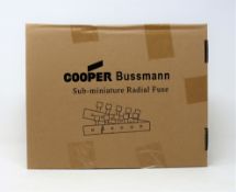 A box of 1000 as new Eaton Bussmann SR-5H-4A-AP T 4A 250VAC Sub-Miniature Radial Fuses (Box