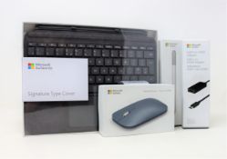 A quantity of boxed as new Microsoft Surface accessories to include: 1x Signature type cover in