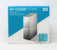 A boxed as new WD My Cloud Home 2TB NAS Drive in White (M/N: WDBVXC0020HWTEESN) (Box sealed).