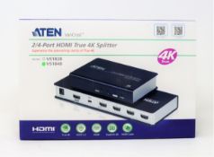 A boxed as new Aten VS184B 4-Port HDMI 4K Splitter (Damaged box).