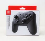 A boxed as new Nintendo Switch Pro Wireless Controller in Black (M/N: HAC-A-FSSKA EUR).