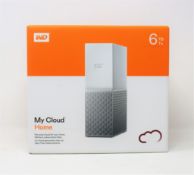 A boxed as new WD My Cloud Home 6TB NAS Drive in White (M/N: WDBVXC0060HWT-EESN) (Box sealed, some