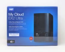 A boxed as new WD My Cloud EX2 4TB Ultra Desktop NAS Drive (M/N: WDBVBZ0040JCH-EESN) (Box sealed).