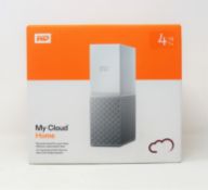 A boxed as new WD My Cloud Home 4TB NAS Drive in White (M/N: WDBVXC0040HWT-EESN) (Box sealed).