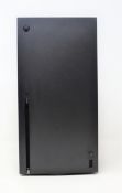A pre-owned Xbox series X 1TB console in black (unit only) (no cables/controllers).