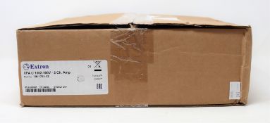 A boxed as new Extron XPA U 1002-100V Audio Power Amplifier Two Channel Amplifier (UK power lead