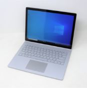 A boxed pre-owned 13.5