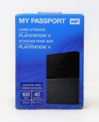 A boxed as new WD 4TB My Passport Portable Gaming Storage for PlayStation 4 in Black (Box sealed).