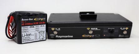A pre-owned Carplounge Raymarine 2.4Ghz GPS Autopilot Transmitter Box with power supply, UK plug