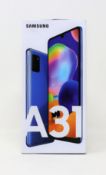 A boxed as new Samsung A31 SM-A315G/DS 128GB in Prism Crush Blue (Box damaged , UK plug included) (