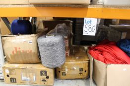 A quantity of yarn, fabric and related items.