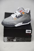 A pair of children's as new Nike Air Jordan 3 Retro trainers (UK 3.5) (Some dirt marks inside the