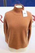 An as new Zimmermann cashmere turtleneck sweater in camel (UK 8 - RRP £275).
