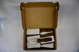 Twelve as new Don Carlos Original Pallet Knives (4530-04,00).
