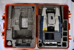 A pre-owned Sokkia SRX5X Robotic Total Station with case.