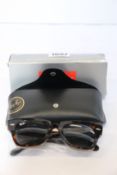 A pair of as new Ray Ban sunglasses.