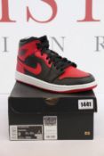 A pair of as New Nike Air Jordan 1 Mid (UK 8).