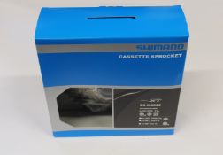 Two boxed as new Shimano XT CS-M8000 HG-X11 cassette sprockets.