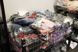 A quantity of as new clothing and related items.