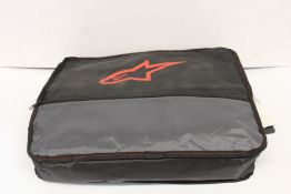 An as new Alpinestars KMX-9 V2 Graphic 1 suit (EU 52).