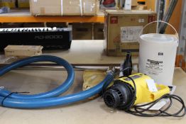 A pre-owned Lutz MI 4 Drum Pump Set (Some damage to handle).