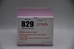 Six Clarins multi - active jour targets fine lines, antioxidant day cream (6 x 50ml).