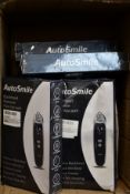 Ten boxed Auto Smile blackhead remover vacuum tools (Damage to some boxes).