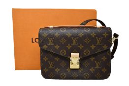 An as new Louis Vuitton Pochette Métis bag with dust bag and box.