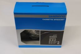 Three boxed as new Shimano XT CS-M8000 HG-X11 cassette sprockets.