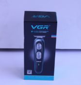 Thirty four VGR - V-055 professional hair trimmers.