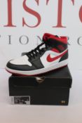 A pair of as New Nike Air Jordan 1 Mid (UK 12).