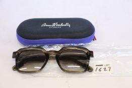 A pair of as new Anne & Valentin sunglasses.