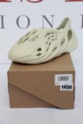 A pair of as new Adidas Yeezy Foam Rnnr in sand (UK 9).